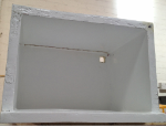 The inside of the box, with the LED strip glued and access hole for the pipework visible