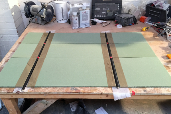 Preparing the table. CF tubes glued to edges of foam sheets.