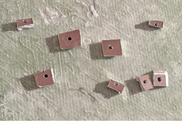 Some junk aluminium blocks, tapped with an M6 thread