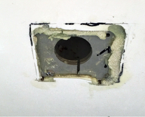 The plate, epoxied into place